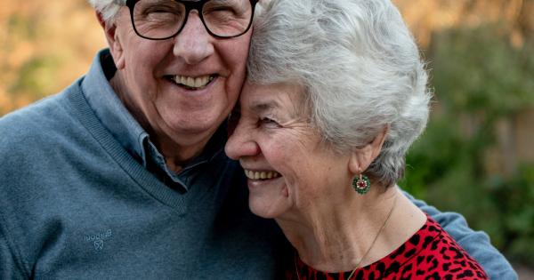 Older happy couple smiling